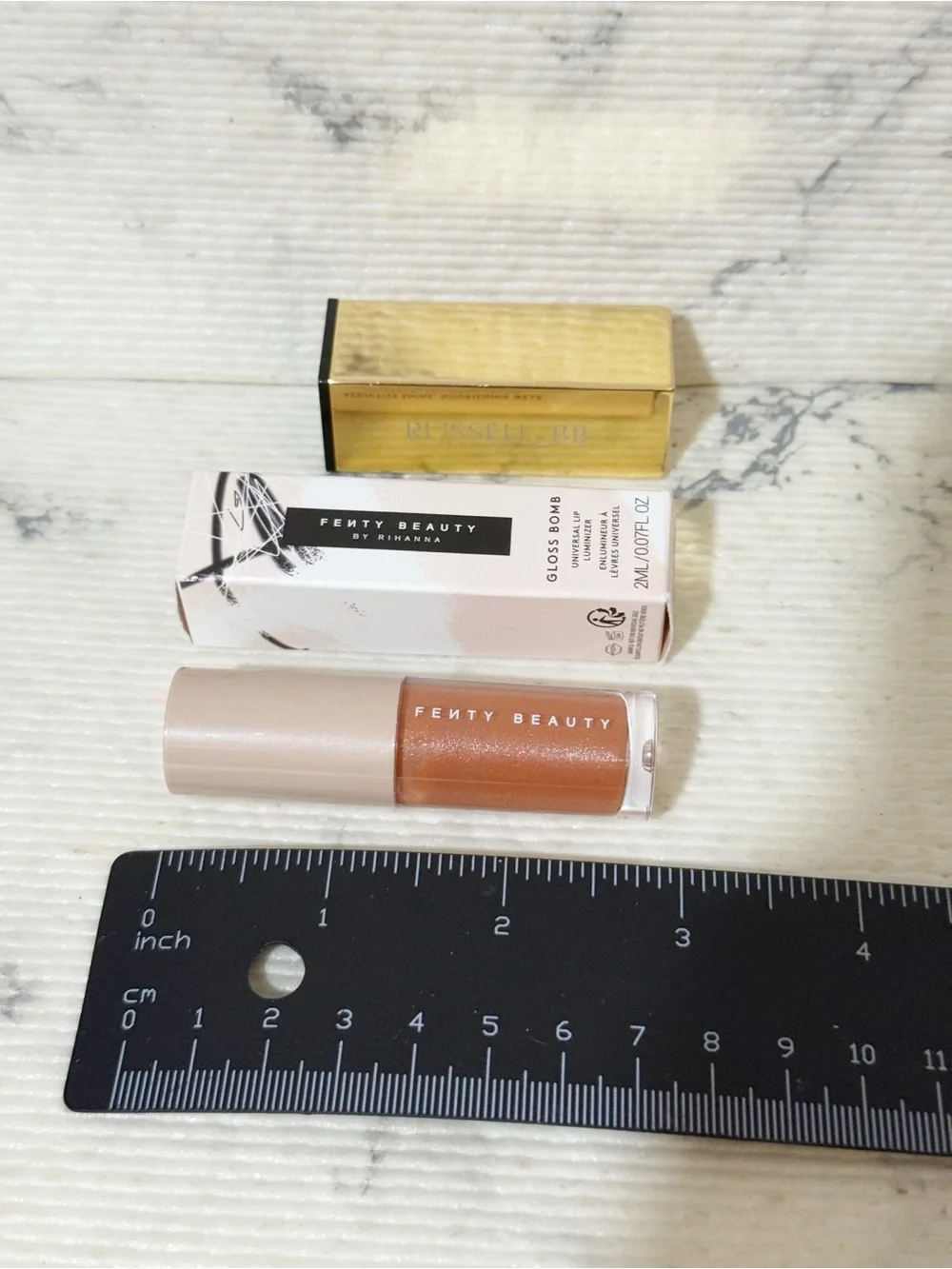 Fenty Beauty Gloss Bomb Lip Luminizer in Fenty Glow Shimmering Rose Nude